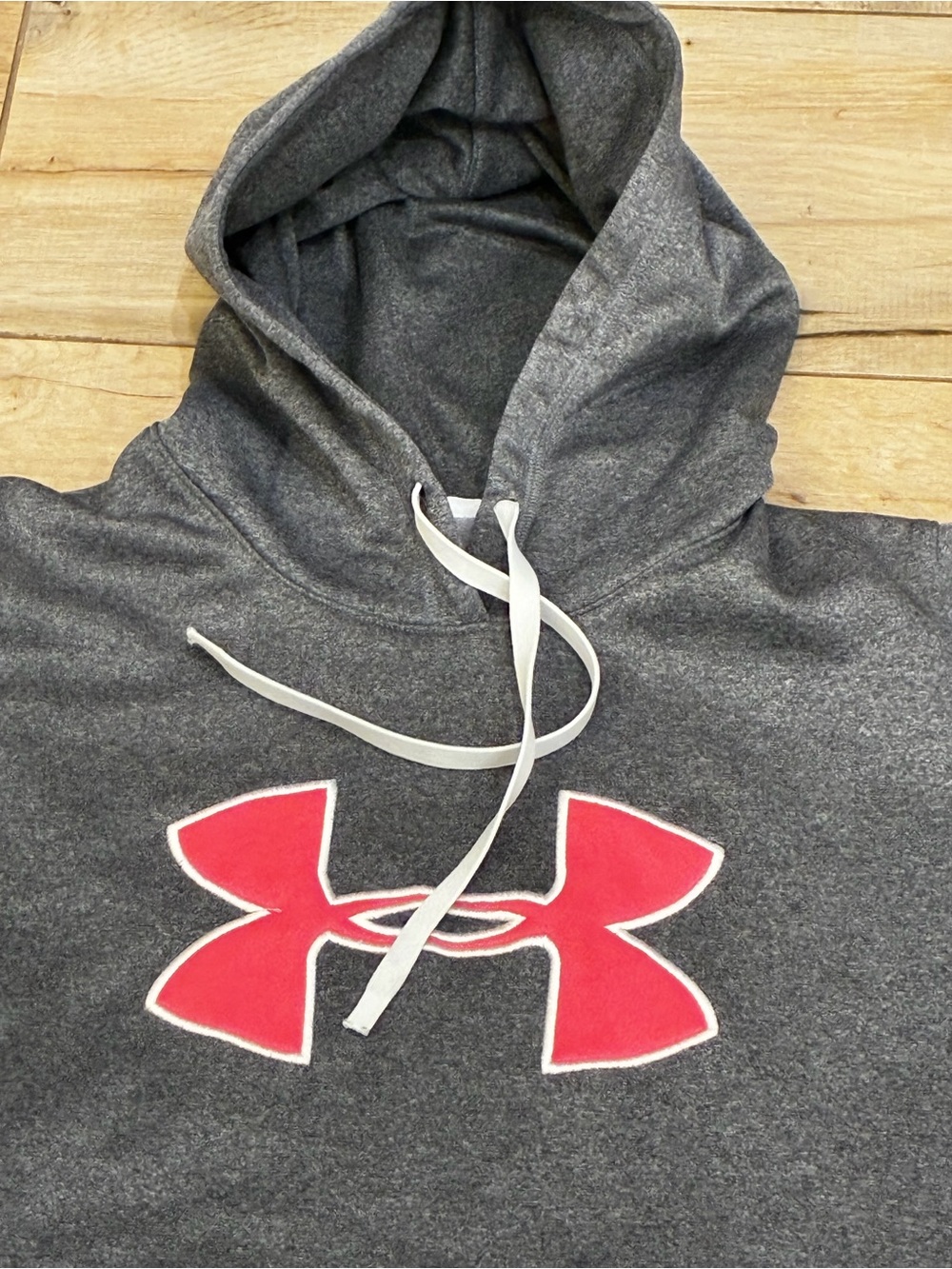 Women’s semi fit Under Armour storm Gray Hoodie with Pink Emblem